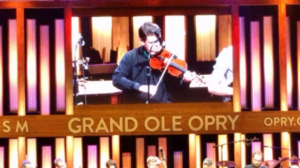 Brian Christianson plays his fiddle at the Grand Ole Opry with his new VioStrap.